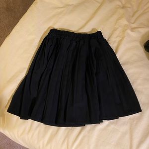 Black pleated skorts
